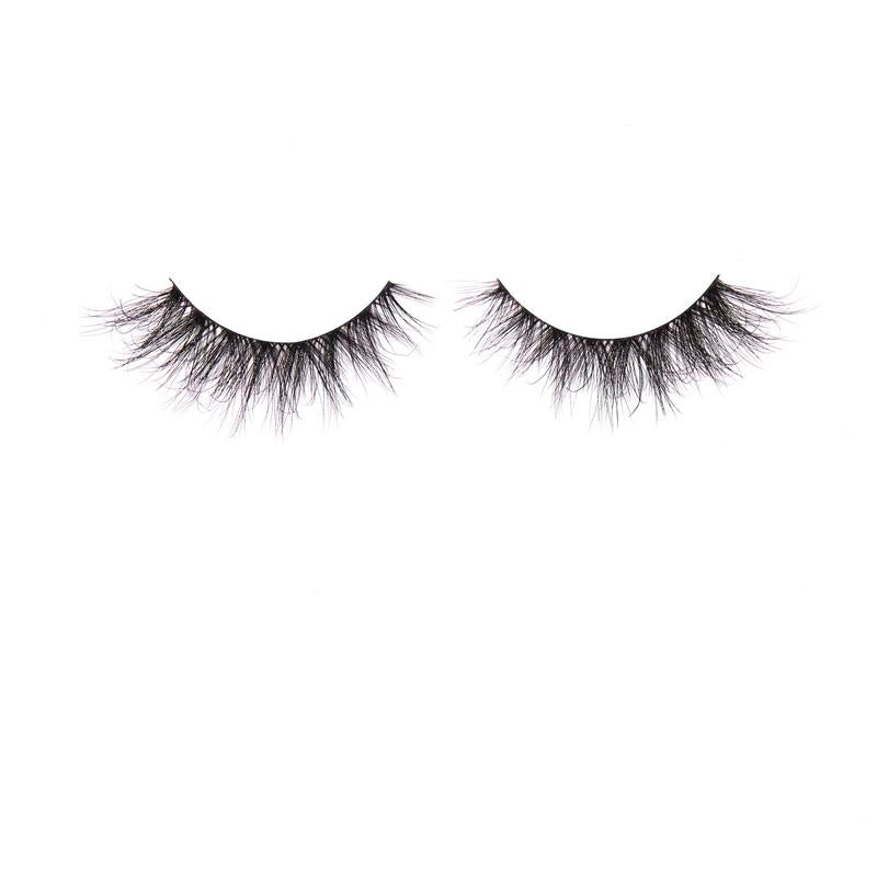 Pair of false eyelashes on a white background